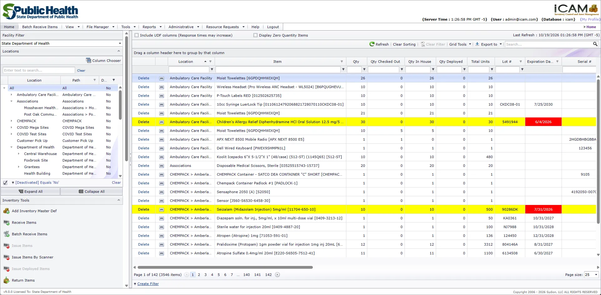 The iCAM home screen. On the left, a facility filter, a tree of facilities and storage locations, and a list of inventory tools such as Receive Items and Batch Receive Items. On the right, the inventory grid lists items by location with quantity, quantity checked out, quantity in house, quantity deployed, total units, lot number, expiration date and serial number. Two expired lots are highlighted in yellow with their expiration dates in red.